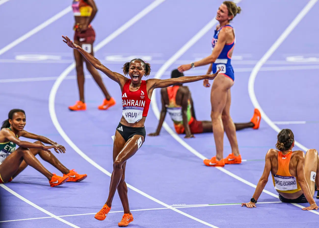 Winfred Yavi celebrating her Olympic gold medal