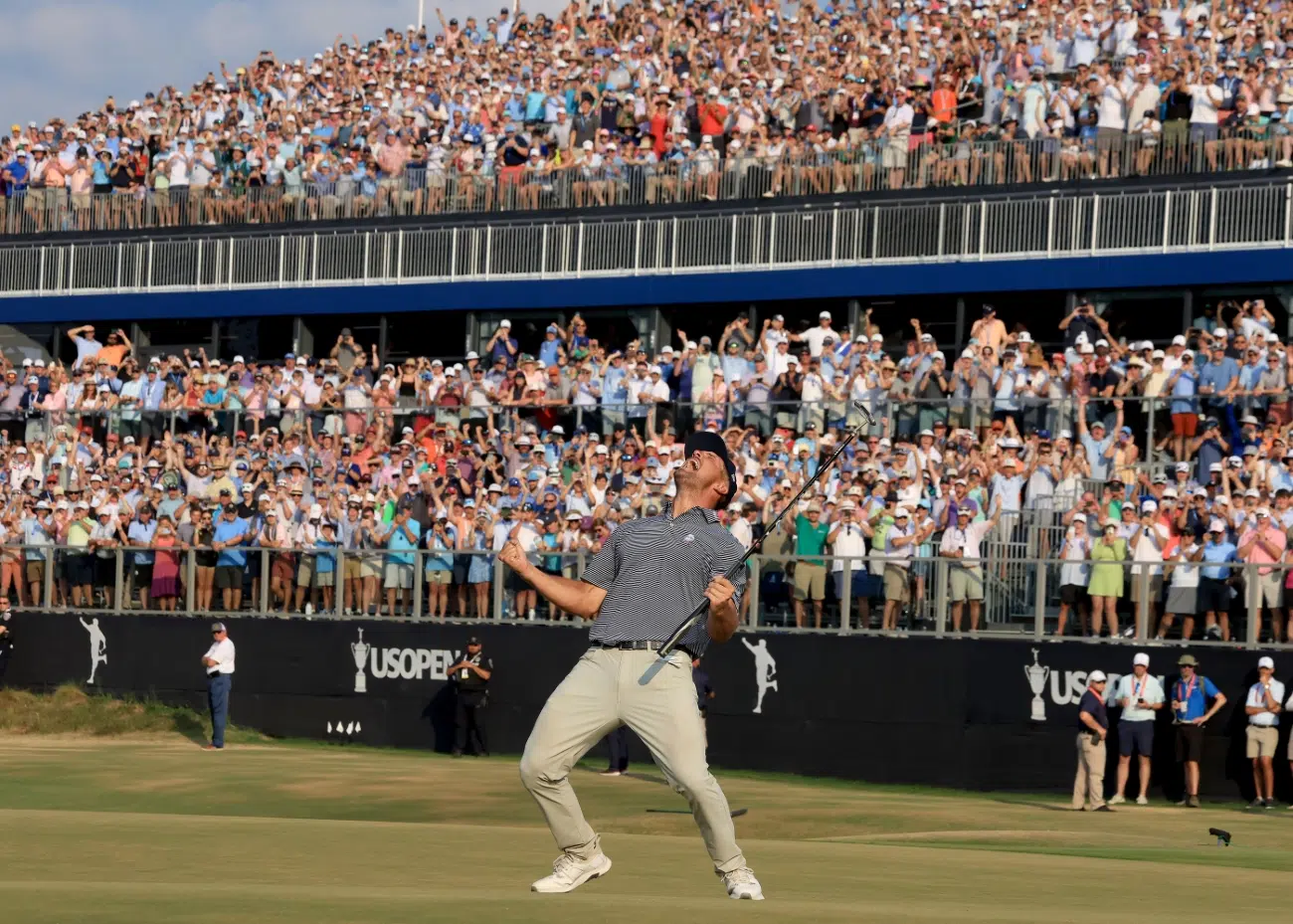 Bryson DeChambeau of The United States celebrates his winning putt on the 18th green during the final round of the 2024 U.S. Open Championship