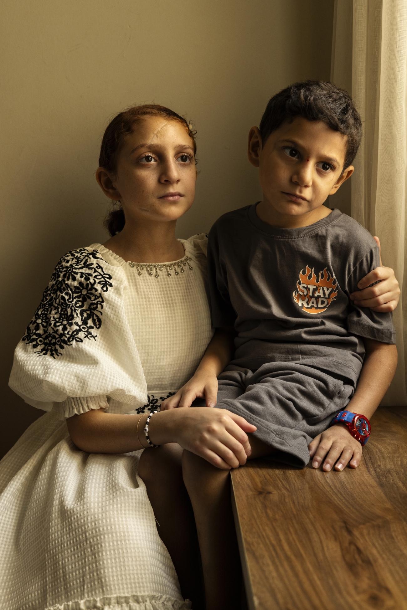 Sibling survivors of an airstrike in Gaza