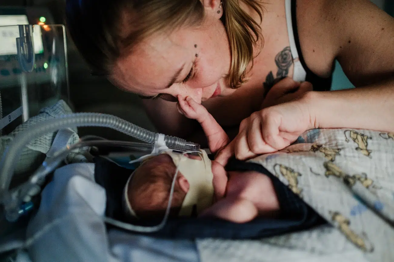 Nurse helping preemies in the neonatology and neonatal intensive care units at Rennes University Hospital, 